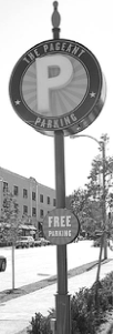 Pageant free-parking sign illustrating Delmar redevelopment update. Photographer not credited.