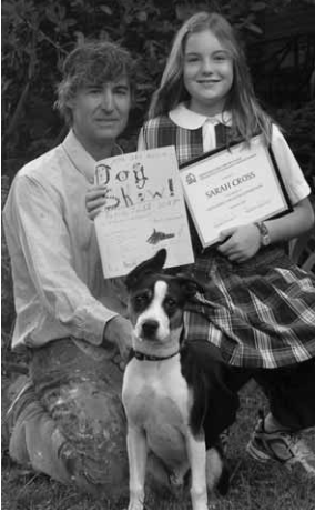 Sarah Cross, dog show award and family dog.