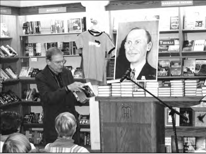 Robert Kohn discussing brother Bill’s painting; portrait of father Rudy was painted when Bill was fourteen.