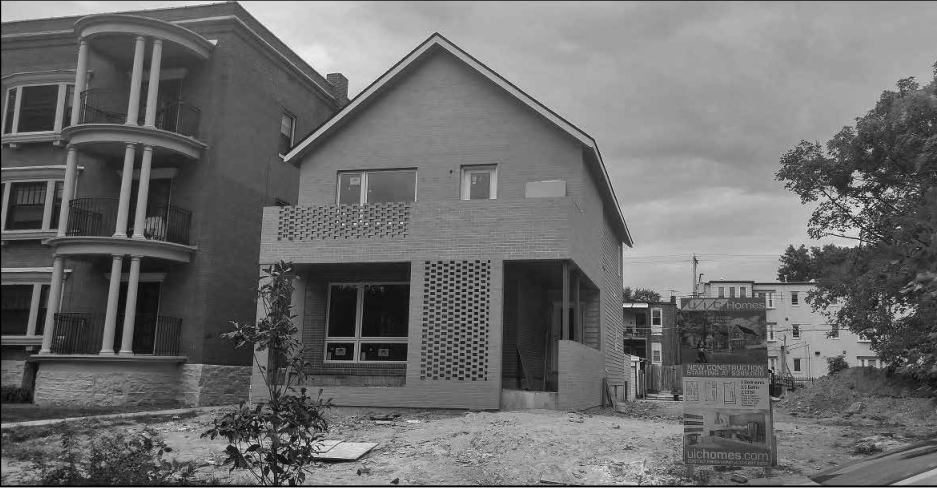 New UIC home at 6007 Pershing; two additional homes planned.