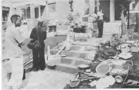 This is not tornado damage; it is a view of one of the twenty something yard sales of Rags to Riches 1993. Photographer not credited.