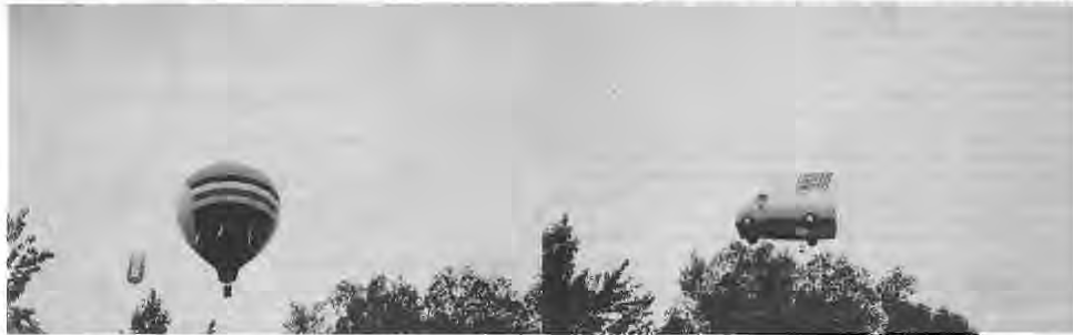 Balloons falling into Skinker DeBaliviere photographed from the backyard of Anna and Horace Busch. Photographer not credited.