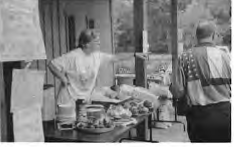 Food sales at Rags to Riches. Photographer not credited.