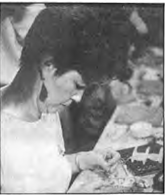Neighbor Dee Joyce Hayes,St.Louis Circuit Attorney,was among the adults who tried their hand at tile making. Photographer not credited.