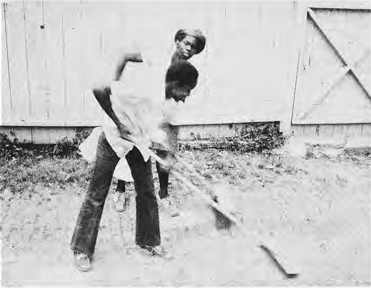 Neighborhood Improvement Crew: front, Anthony Thompson; rear, Willie Robinson.
