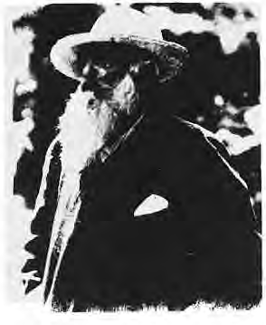 Original portrait of Monet wearing a hat.