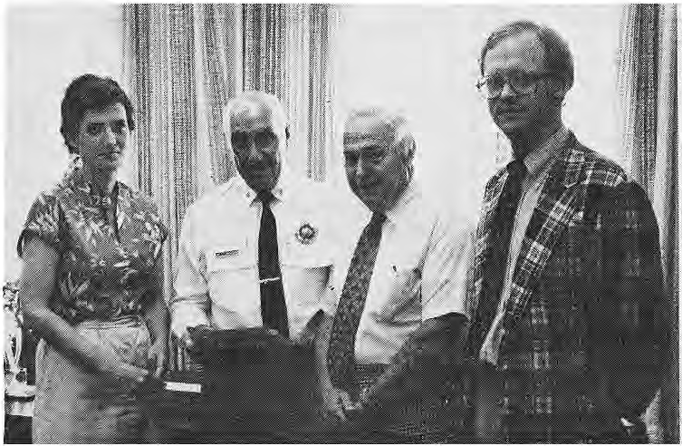 Original check presentation photograph at the vest fundraiser.