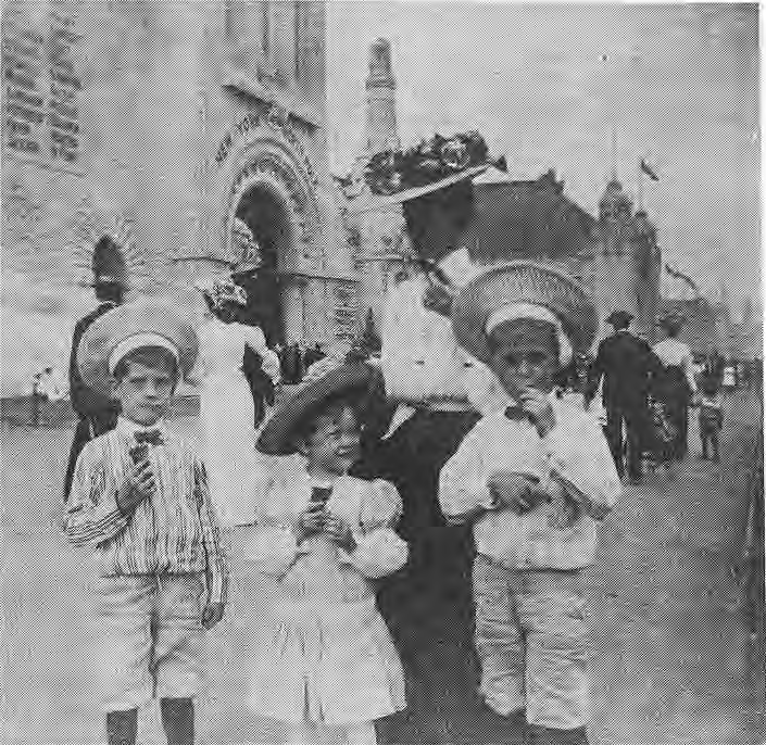 Children eating ice cream in a 1904 World’s Fair photograph.