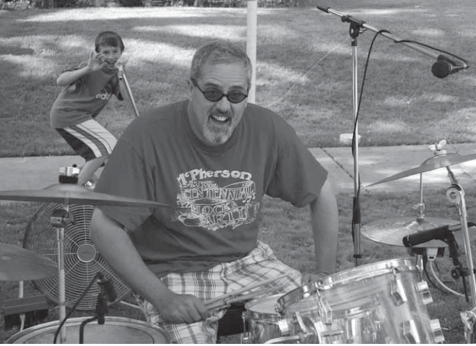 Mc Pherson block party featured Dick Hereford’s band. Photographer not credited.