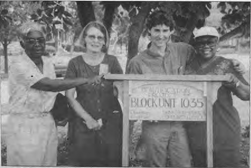 From left: Veatrice Perkins, Glori L’Ecuyer, Andy Cross, sign maker, and Ronie Haliburton. Photographer not credited.