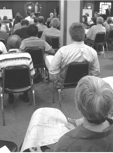 Neighbors meet Metro officials at St. Roch Church Hall. Photo by King Schoenfeld.