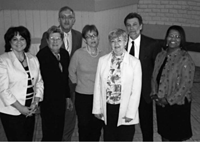 From left, Christine Buck; Kathleen Nelson; Jeffrey L. Fister; Barbara Perry Lawton; Jan Scott; Tom Eschen; and Carol A. Daniel. Photographer not credited.