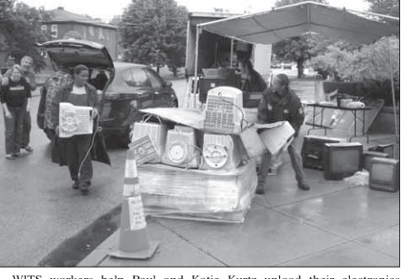 WITS workers help Paul and Katie Kurtz unload electronics at SDCC’s first recycling fair.