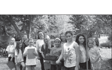 St. Roch fourth-grade Girl Scouts planting Brightside flowers.