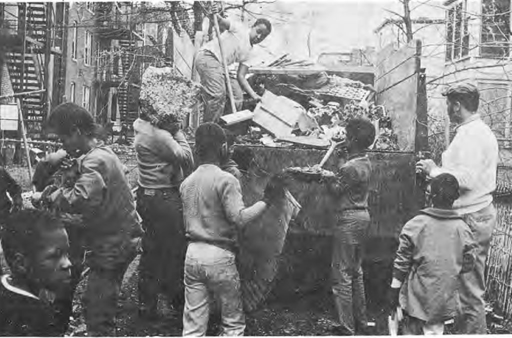 In Rain-Or-Shine Residents & Volunteers Clean Up Area — original newspaper photograph, May 1970