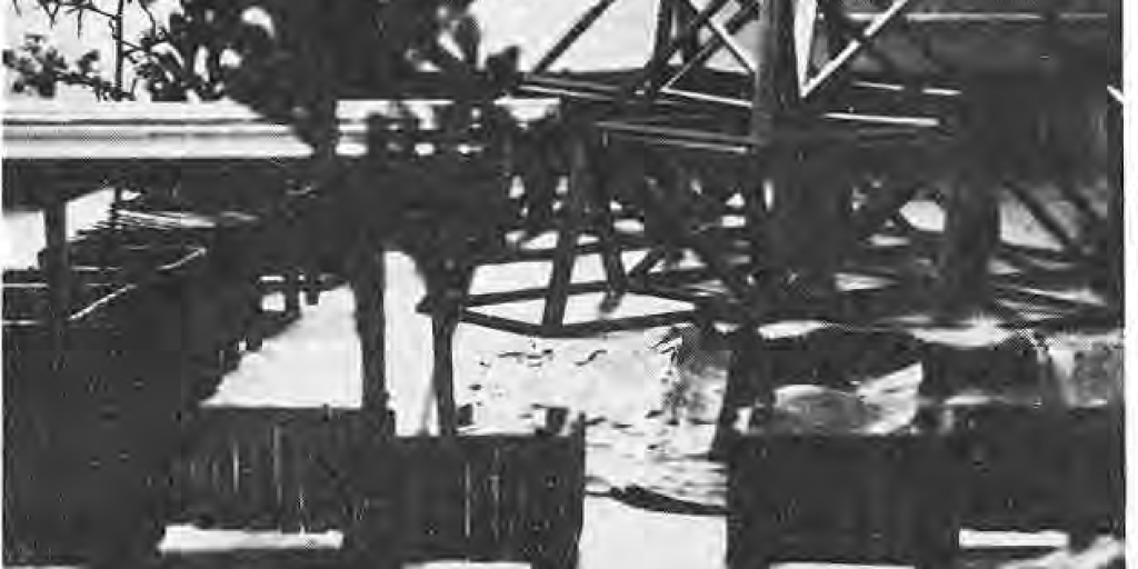 Original photograph of the proposed Tot Lot model, showing play structures, platforms and miniature landscaping.
