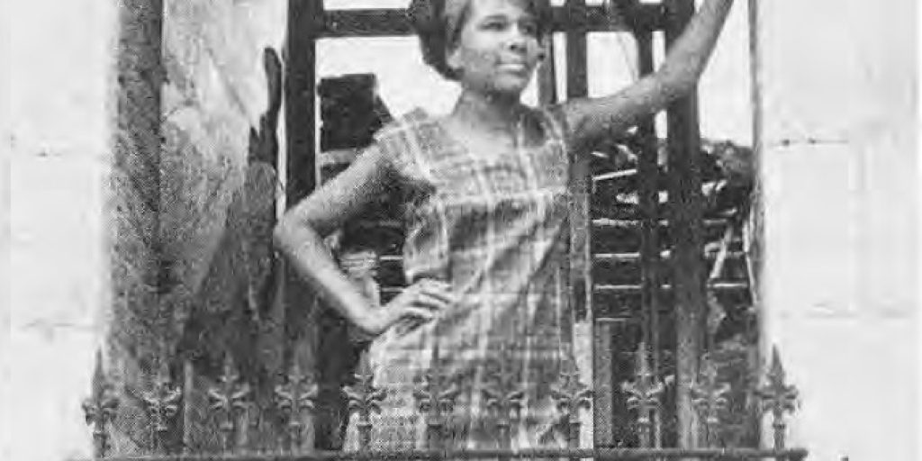 Mary Coleman models a slack and tunic outfit made by the young women for sale in The Boutique Shop, recently opened at 323 DeBaliviere.