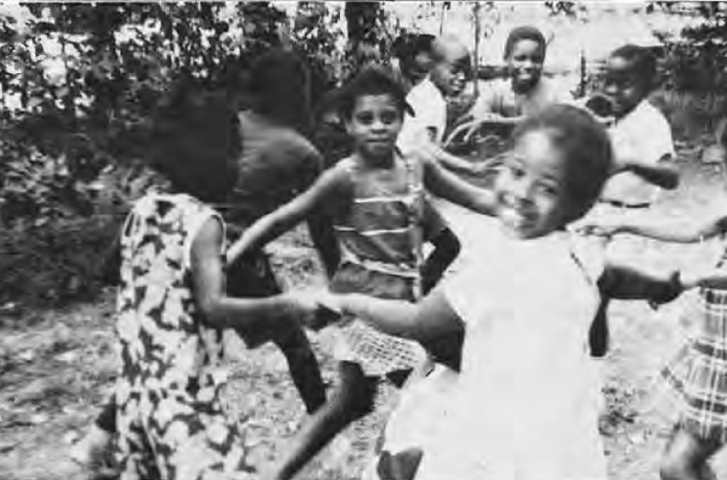 Children playing outdoors in the Something for Summer program