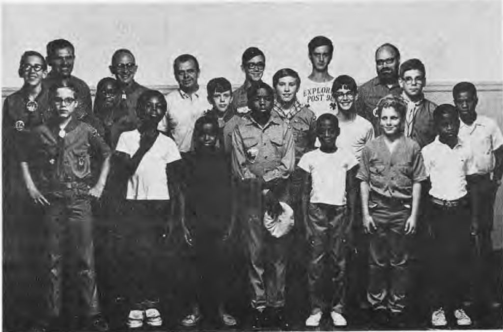 BOY SCOUT TROUPE NUMBER 98 of St. Roch’s celebrate their fiftieth anniversary. Left to right are (first row) Bert Bender, Tom Sleet, Steve Spears, R. J. Stringer, Lester Spears, Bill Manion, unknown; (second row) Jack May, Joe McBride, Joe Newsham, Andy Bender, Tim Flynn, Joseph Wilmering, Jr., Tyrone Howard; (third row) Joseph Wilmering, Sr., Hugh Bertch, Bob Newsham, Charles Lucier, James Flynn and Albert Bender, Sr.