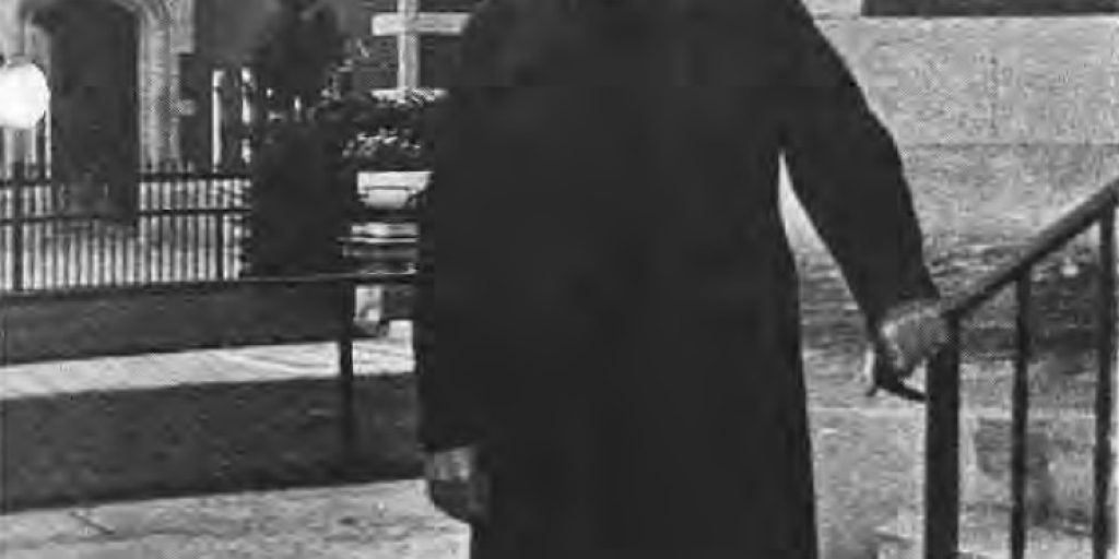 Father Robert Peet outside St. Roch’s Church